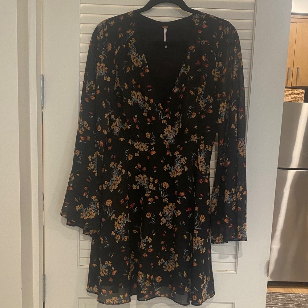 Free People Elegant Black Dress with Floral Accents